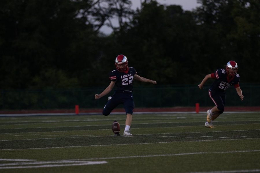 Luke Linden follows through on a kickoff. 