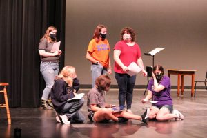 Ms. Gehrke and members of the one act Anne-Arky rehearse their lines at a recent practice. 