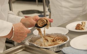 Mrs. Pizzos Culinary Arts class makes sweet treats, such as cookies & cinnamon rolls.