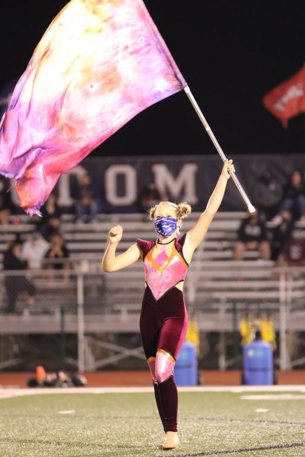 ?????? of the color guard performs at halftime at the varsity football game against Francis Howell North on Sept. 25.