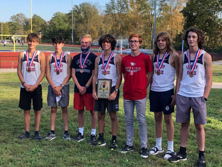 The boys cross country team won their first ever conference title. 