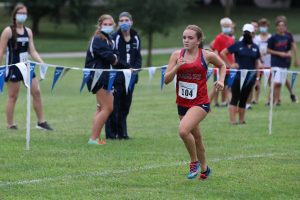 Ally Kruger races to the finish line at the Forest Park Invitational that took place this season on Sept. 12 at McNair Park. 