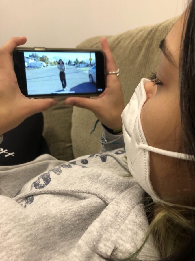 Vianca Malave watches the music video to hit song Drivers License by Olivia Rodrigo.