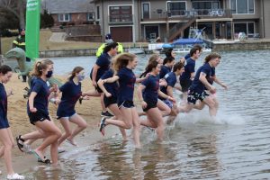 Students plunge into a freezing cold Lake St. Louis to raise money for the Special Olympics of Missouri.