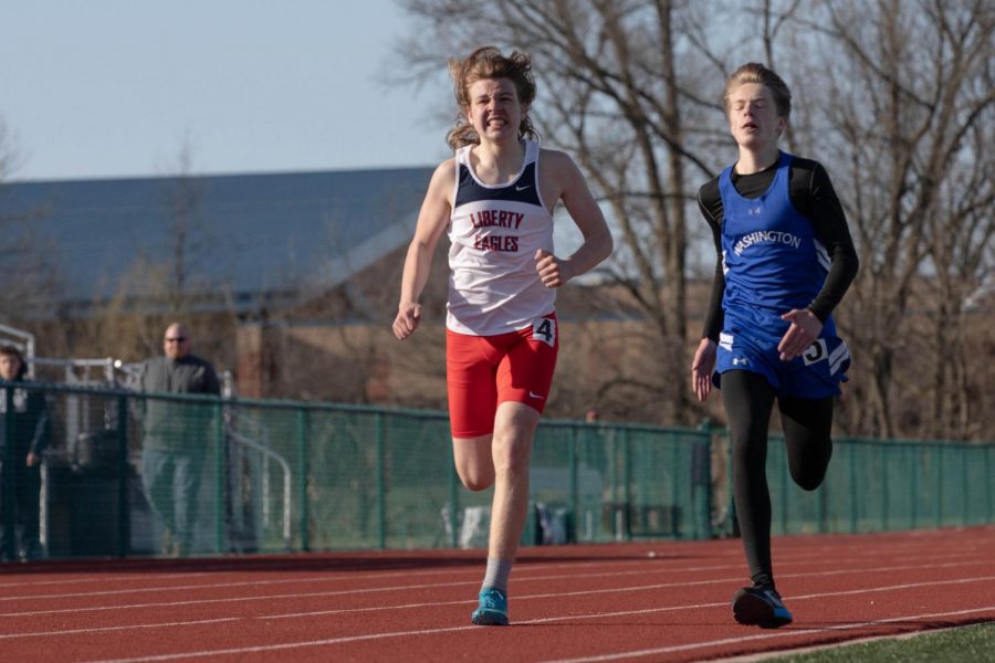 J.D. Grana pushes through the final stretch of his 1,600 meter race Thursday, April 1. 