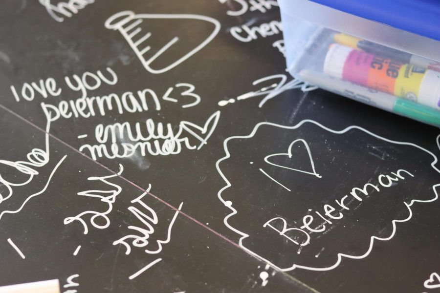 Mrs. Beierman hosts a lab table with erasable markers in her classroom, which is kept always full of positive messages towards her and others.