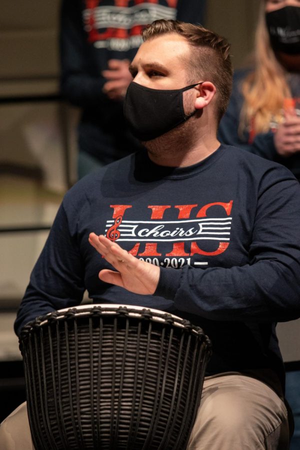 Mr. Datz, the incoming choir teaching, plays the djembe.