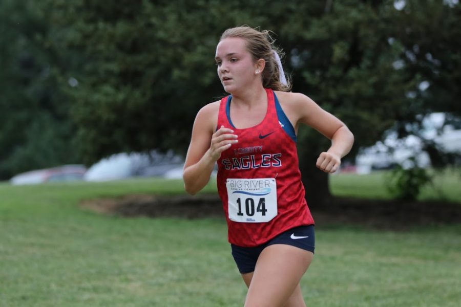 Ally Kruger runs in a cross country race in the fall at McNair Park. In April, Kruger broke a 30-year record at a track meet in Jefferson City and was also named the Gatorade cross country runner of the year in Missouri. 