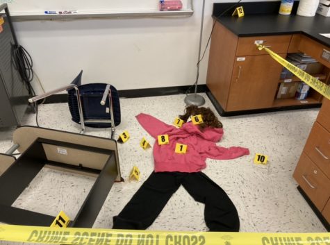 The crime scene is set up in the back of the PBS classroom. 
