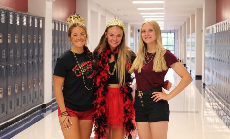 Molly Marino, Brooklyn Rudolph, and Lillia Clay the day of the homecoming game dressed up for spirit week in all red, black and gold.