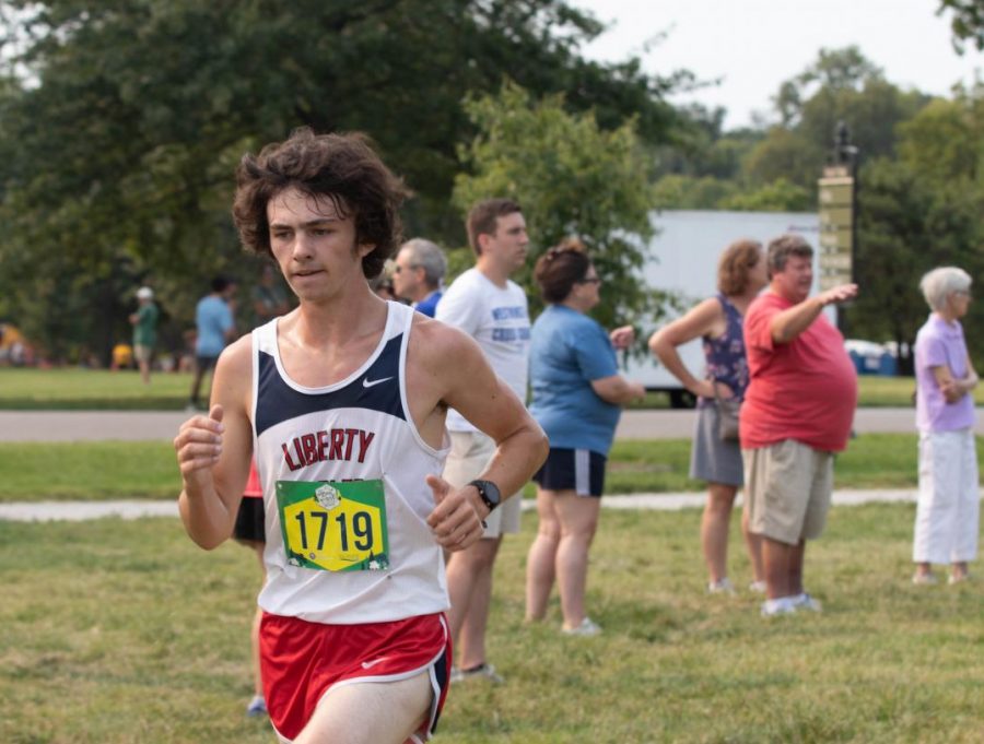 Collin Fay (12) at the Forest Park meet on Sept. 11. Fay recently set the school record with a PR of 16:41.