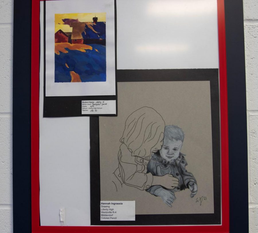 The sketch (on the bottom right) was drawn by Hannah Ingrassia with colored pencils. 