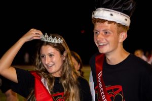 Amira Khayyat (12) and Patrick ODay (12) are awarded crowns during the homecoming football game for winning homecoming queen and king. 