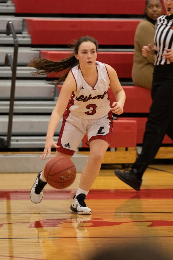 Blair Wise keeps possession of the ball in a game against Rosati-Kain last season. The girls’ basketball team will be looking to come back in style with a new look and classic razzle-dazzle.