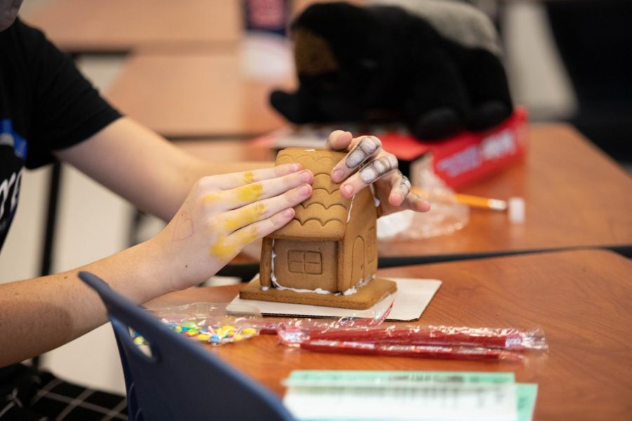 German club upholds their annual tradition of making Gingerbread houses during the holiday season.