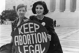 Jane Roe (left) and her lawyer Gloria Allred on the steps of the U.S. Supreme Court April 1989, where the Court heard arguments in a case that could have overturned the Roe v. Wade decision.