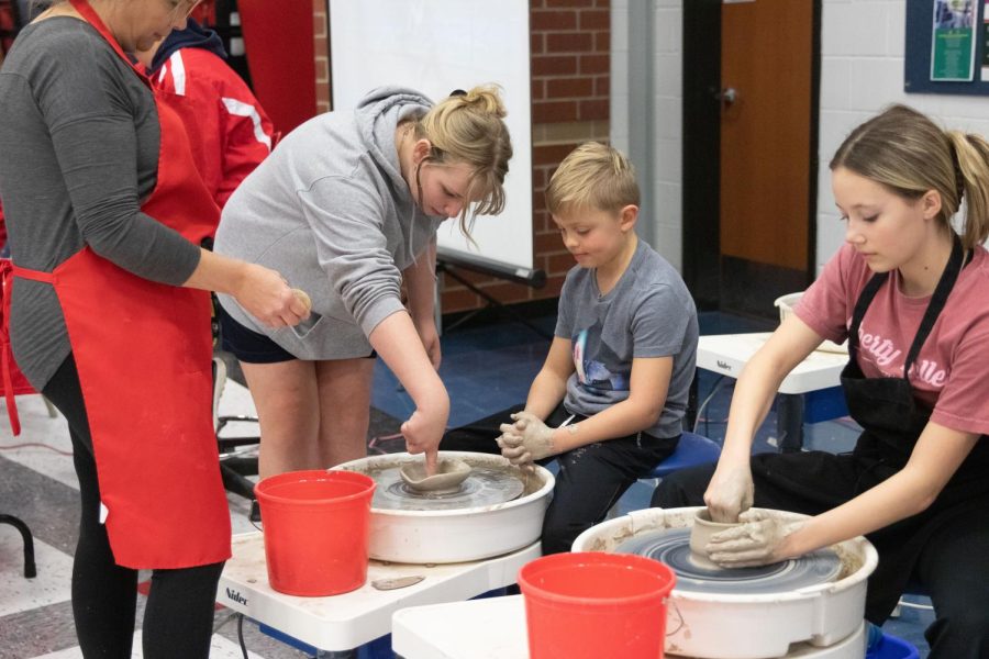 Art teacher Mrs. Middendorf set up hands-on activities where students could practice using clay. 