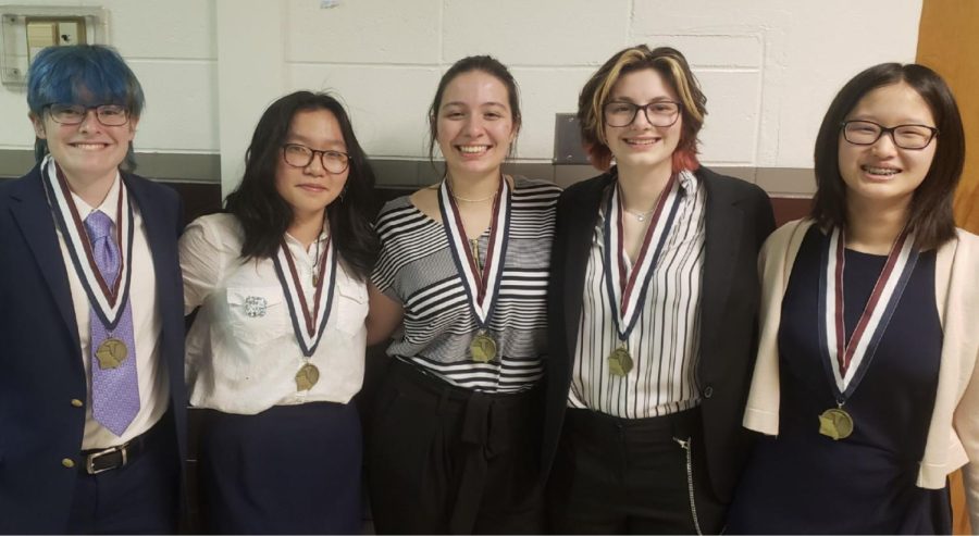Anna+Morrison%2C+Fiona+Do%2C+Amelia+Huebbe%2C+Julia+Wiley+and+Sophia+Fiorino+posing+with+their+state+champion+medals+at+the+conference.