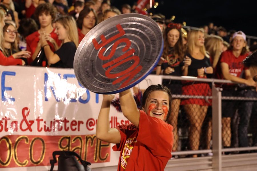 Tess Roberts held the spirit can at the homecoming game last fall. 