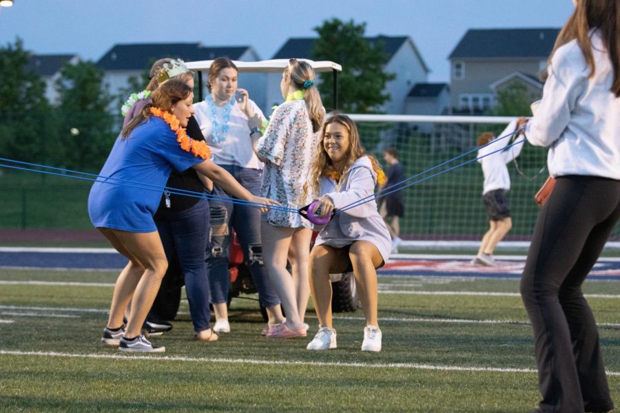Seniors spend their time playing yard games on the football field.