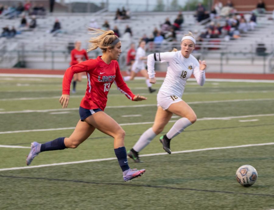 Morgan Struttmann sprints upfield looking for a scoring opportunity in the Senior Night game against Zumwalt East on May 3. Struttmann scored two goals in Libertys 5-0 victory. The Eagles have a record of 13-5-1 as of May 9.