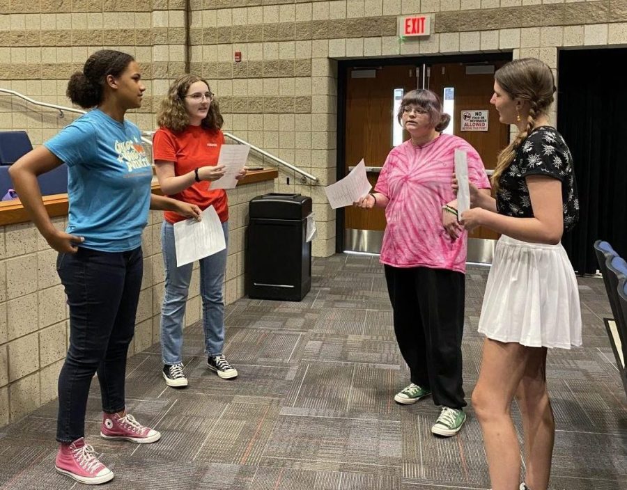(from left to right) Aicha Beye (11), Marissa Varga (10), Carmen Bickel (9), and Sophia Sikes (9) practice their group scene together during Tuesdays auditions last week.