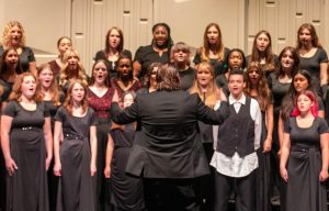 Mr. Datz directs choir students at the LHS fall choir concert on Oct. 11.