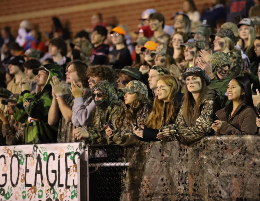 The student section dressed in camo theme for military night at the varsity football game Oct. 7.