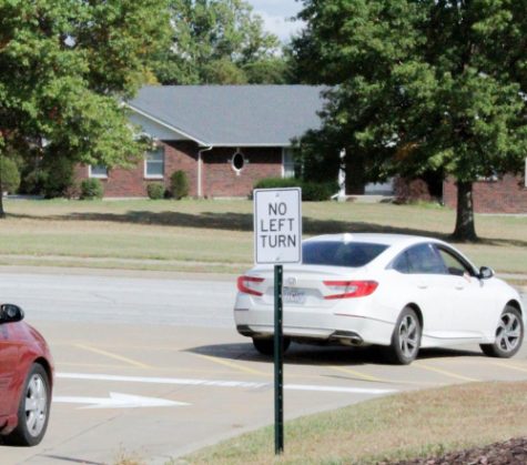 The new No Left Turn sign at the entrance (closest to QT) of the school.
