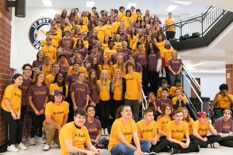 Students sport their Be Kind shirts received through the week gather to take one large picture full of kindness. Each teacher gave out one t-shirt to a deserving student. 