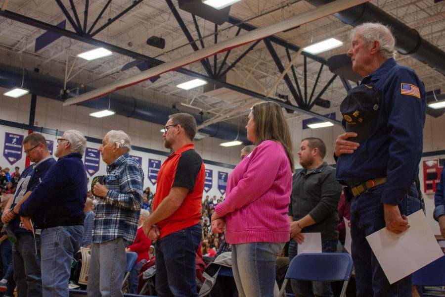 Veterans stood up for the playing of Taps. “Taps” is a special song to the United States military, as it is played at funerals, wreath-laying ceremonies and memorial services of fallen soldiers. It was played by two trumpet members of band during the assembly. 
