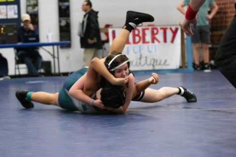 On Dec. 9, Liberty Sophomore _____ _____, wrestled against Timberland. 