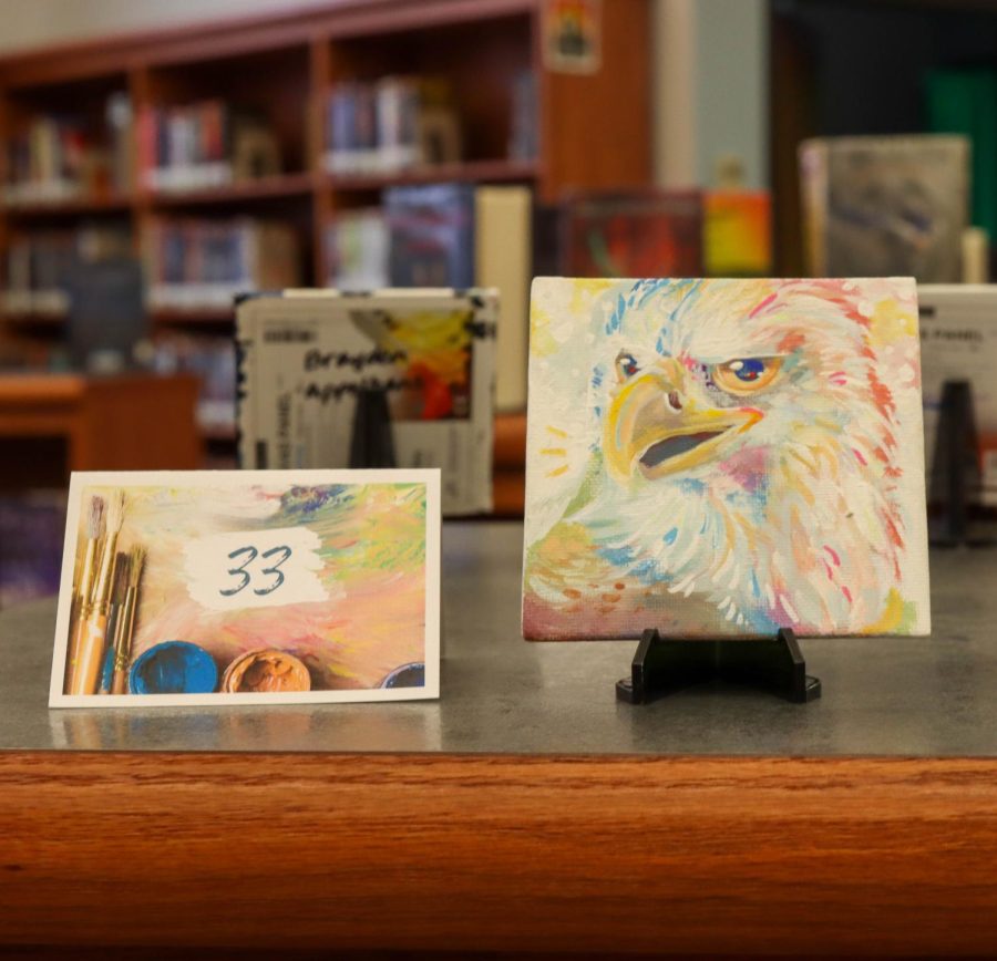 Kaitlyn Beneseks winning eagle painting that won 35% of the vote.