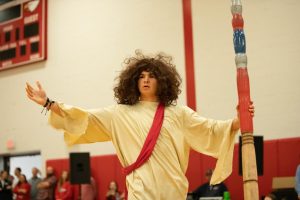 Ryan Casteel, dressed as Moses, begins to part the red sea during Coaches vs Cancer pep assembly on Jan. 5. 