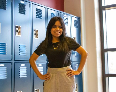 Sathvika Shanker (12) poses with bright hope in Libertys hallway.