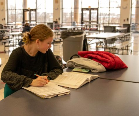 Freshman Madelyn Hamby studies for her finals at the Cookies, Cocoa & Cramming event.