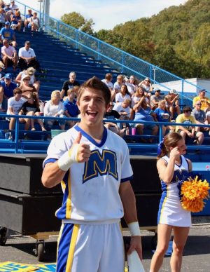 Mr. Collin Johnson cheered collegiately at Morehead State for his last two years of college, where he won multiple competitions. 