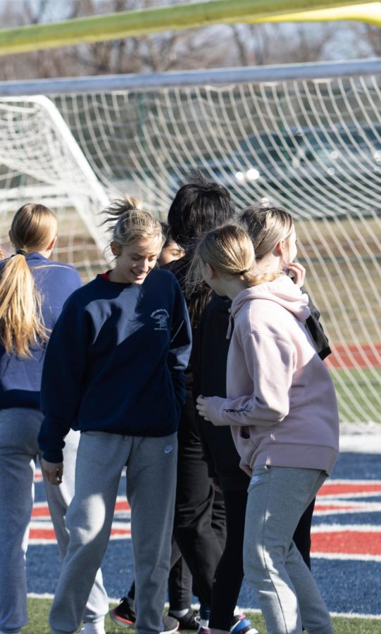 Sophomore Molly Mueller can be seen socializing with her teammates.
