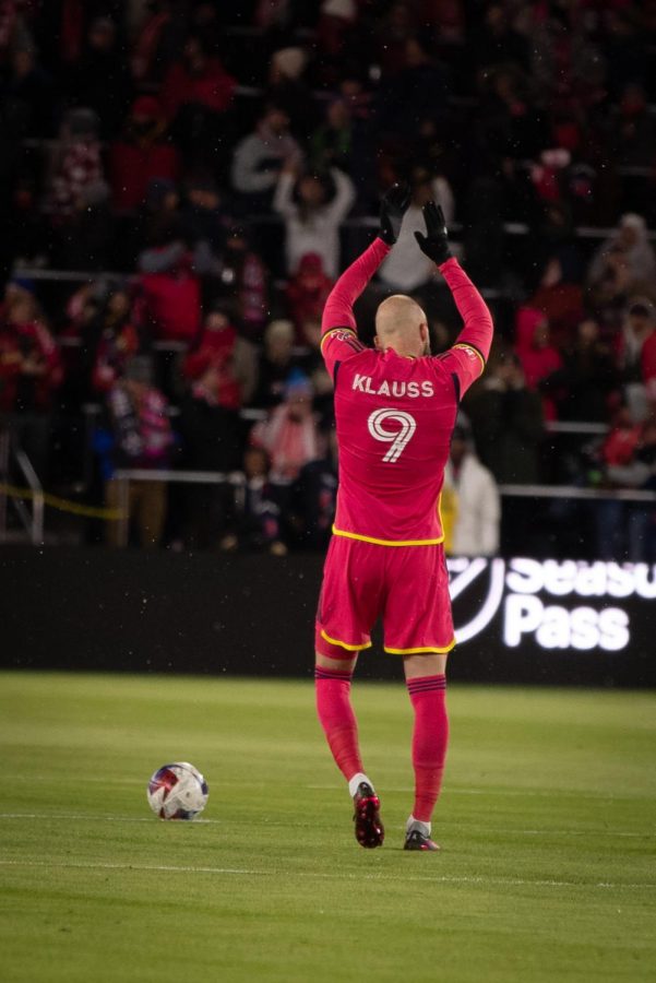 St. Louis CITY SC designated player João Klauss hypes up the crowd moments before kickoff in a match against the San Jose Earthquakes.