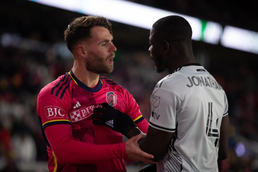 San Jose Earthquakes player Jonathan Mensah confronts St. Louis CITY SC player Eduard Löwen after a foul was committed.