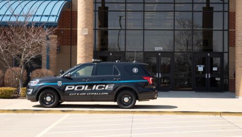 Multiple police cars were present at the front of the school throughout the day on March 30.