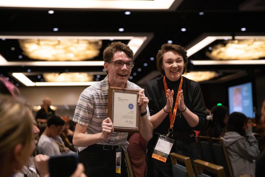 Talon Yearbook Editor-in-Chief Rhett Cunningham (12) celebrates holding the Pacemaker Finalist award with Weekly Content Editor Alix Queen (12). I have given my life to this program for the last four years and I am so proud of how far this staff has come, Queen said. 