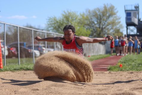 Junior Leilani Green competes in the long jump at Holt High School earlier in the season. At districts, Green competed in the long jump, 400, 4x400, and 200 where she broke the school record. 