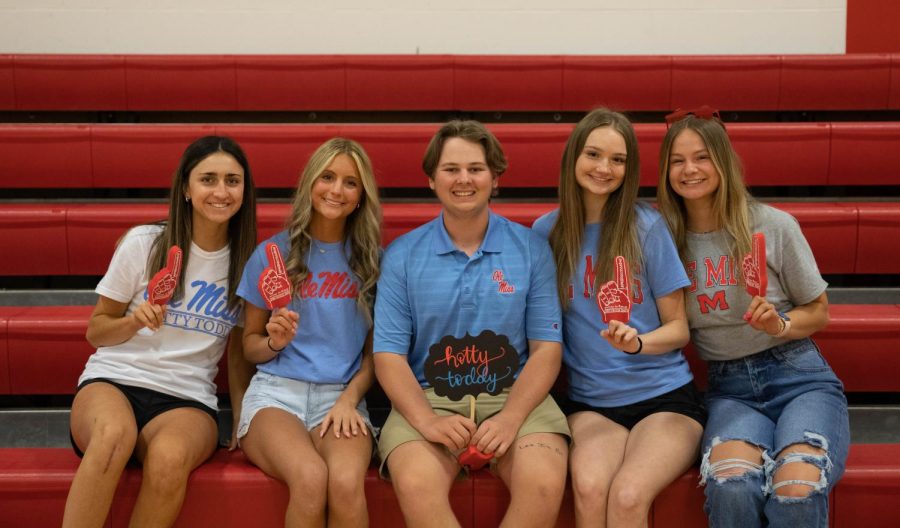 Molly Linck (12), Franchesca Aquino (12), Collin Doniff (12), Caitlin Conrad (12), and Allie Quirk (12) pose for a photo together. All students posed will be attending Ole Miss in the fall. 