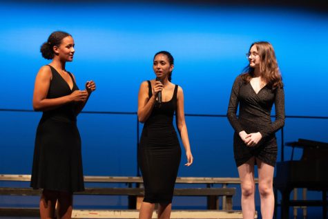 Juniors (left to right) Aicha Beye, Madeline Claravall, and Anna Simms reflect back on the previous act. 