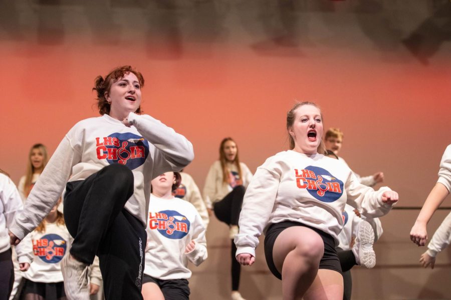 Seniors (left to right) Nora Foeller and Payton Busselman executing their choreography to Eye of the Tiger.
