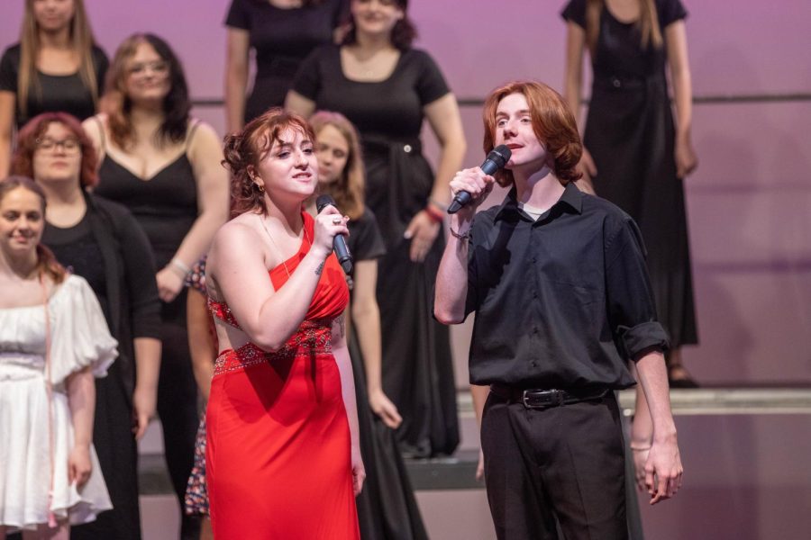 Senior Nora Foeller and junior Connor Higlen singing a duet in Ive Had the Time of My Life.