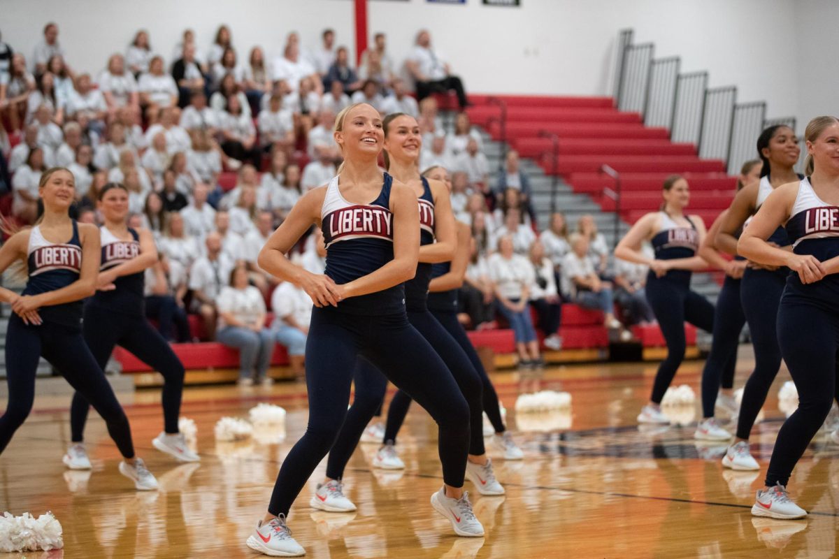 Senior Jenna Handlan dances as a part of the Liberty Belles Varsity dance team at the Superintendents Welcome Back to School event.