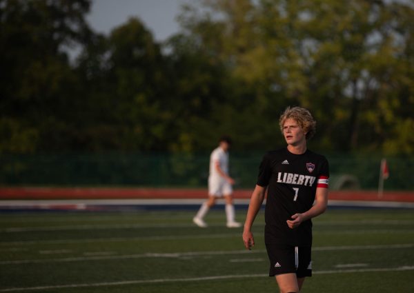 Senior Brady Freeman walks on the field during the game against Chaminade on Aug. 29. After a hard-fought game, the Eagles lost in penalty kicks, 2-1. 