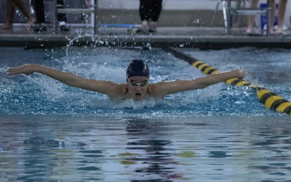 Junior Emma Nolan swims butterfly during a 200 yard IM (individual medley) on Nov. 28 at a meet against Lafayette and Timberland High School. This is Nolans third year being a part of the girls swim team. 